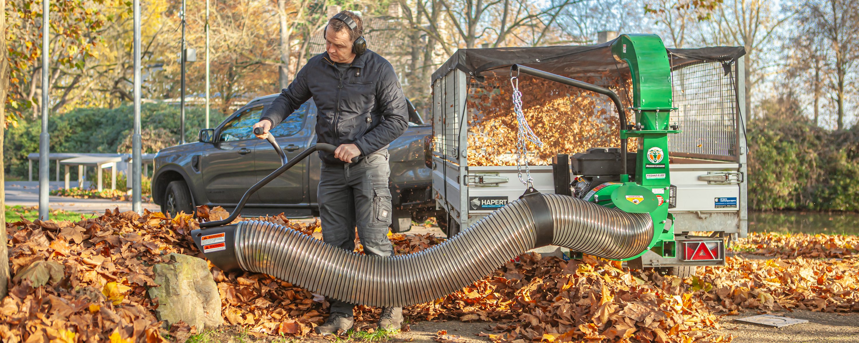 Man actively using debris loader