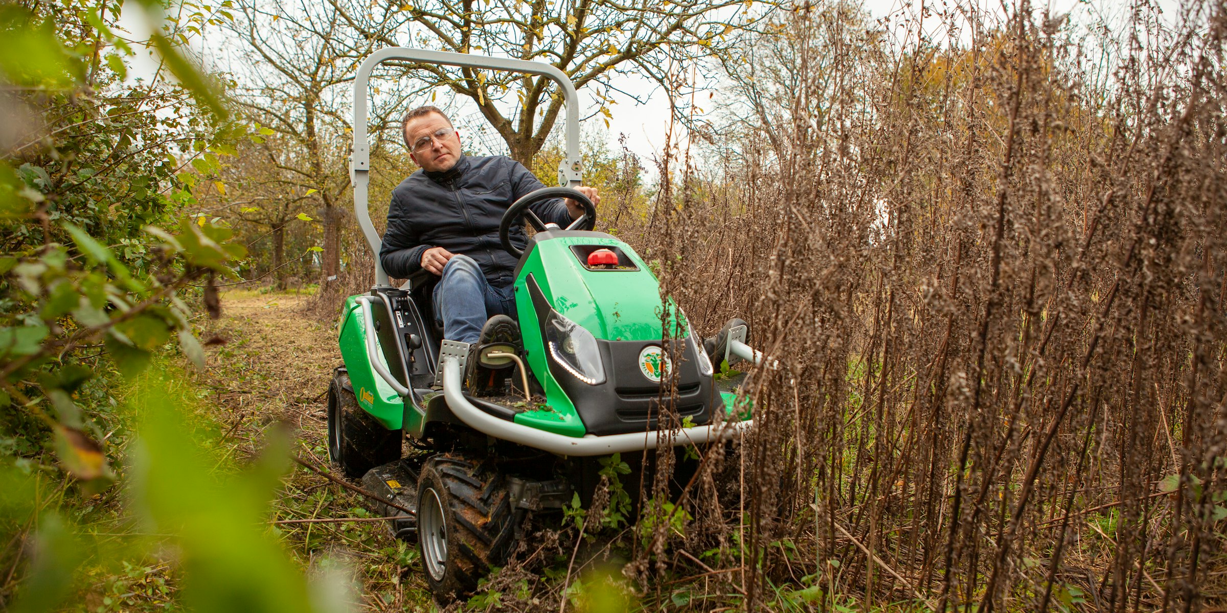 Man on Outback Rider tackling dense vegetation