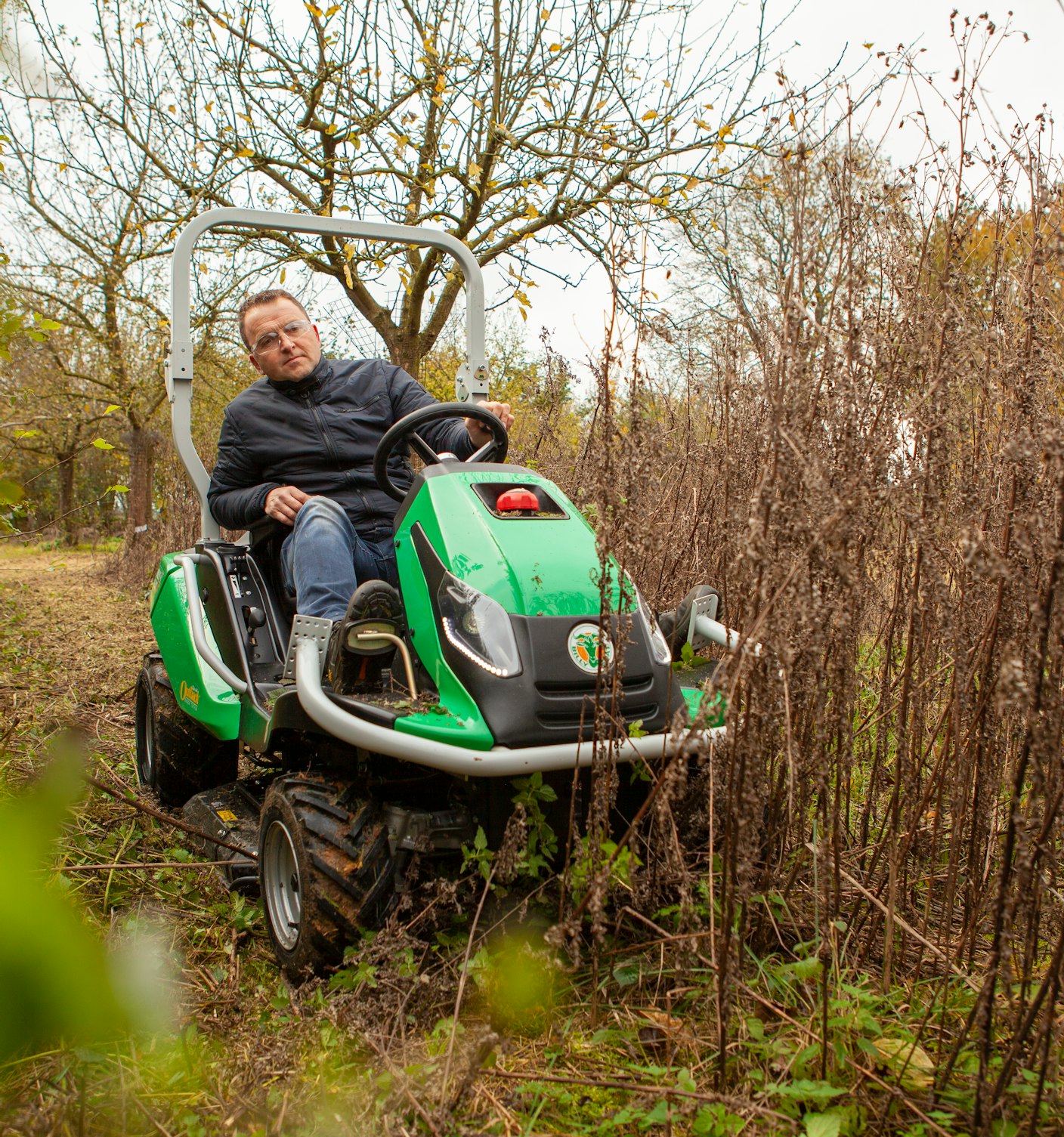 Man on Outback Rider tackling dense vegetation
