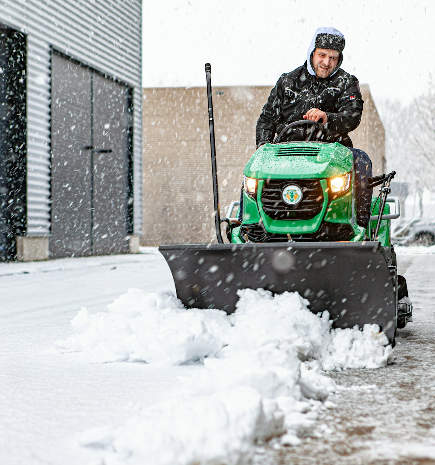 Outback Tractor fitted with snowblade frontal view