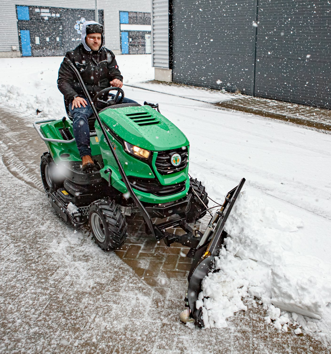 Outback Tractor fitted with snowblade lefthand side view